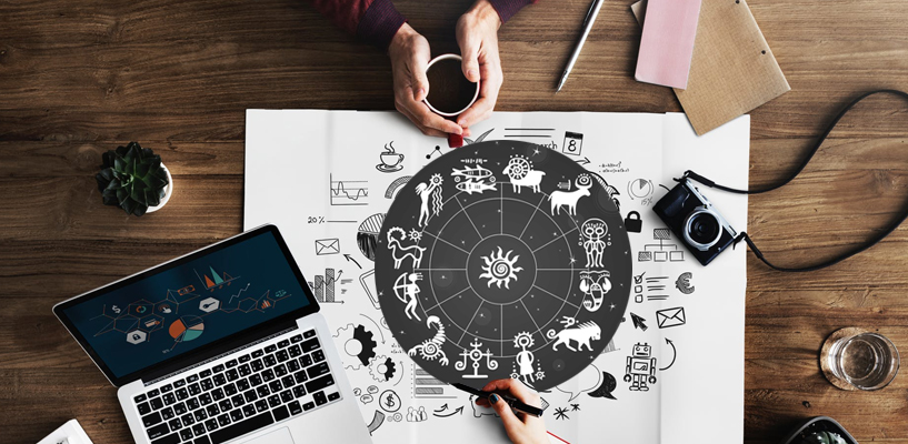 An entrepreneur looking both hopeful and concerned while reviewing business plans and charts, with symbolic planetary alignments visible in the background